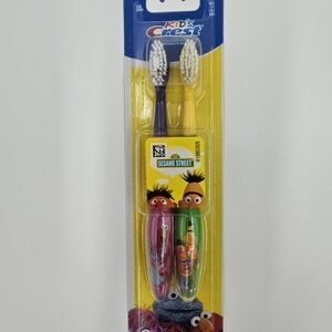 Crest Kids Sesame Street Toothbrushes - Purple & Yellow Handles